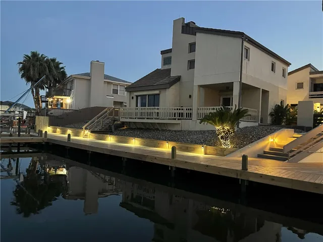 a view of a house with swimming pool