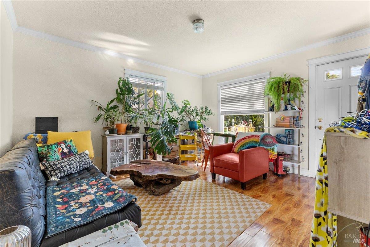 130 11th Street Santa Rosa, CA 95401 - Photo 29 of 50 a bedroom with furniture and a couch