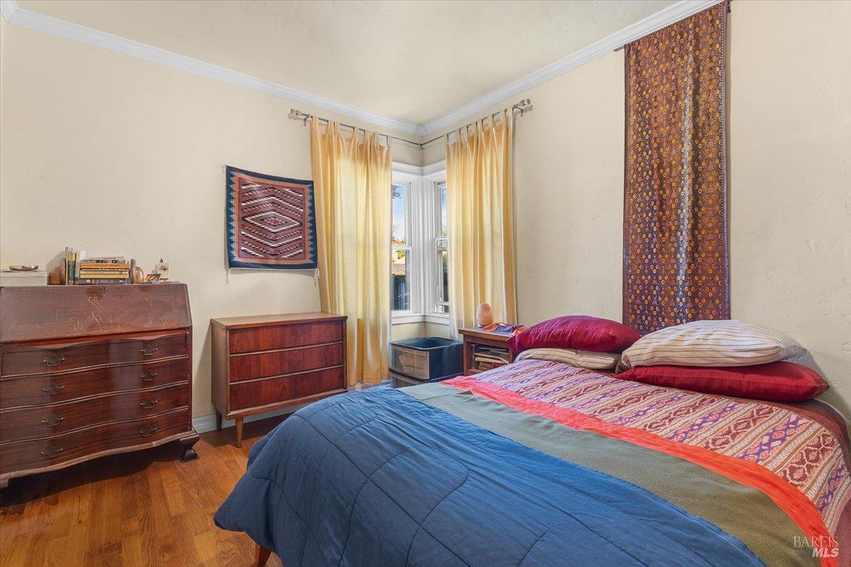 130 11th Street Santa Rosa, CA 95401 - Photo 5 of 50 a bedroom with a bed and a dresser