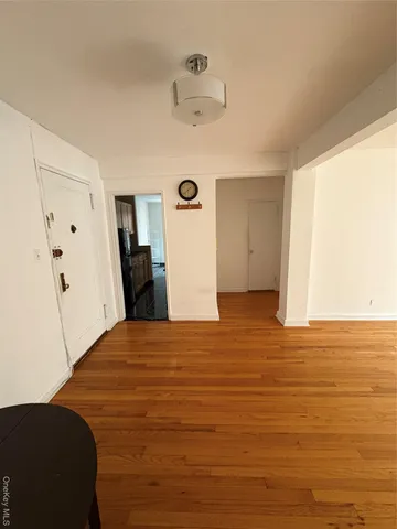 a bedroom with a bed and cabinets