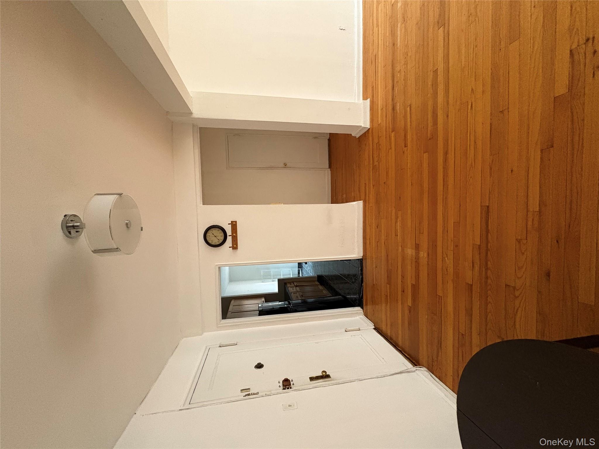 2090 Barnes Avenue, Unit 4D Bronx, NY 10462 - Photo 12 of 14 a bedroom with a bed and cabinets