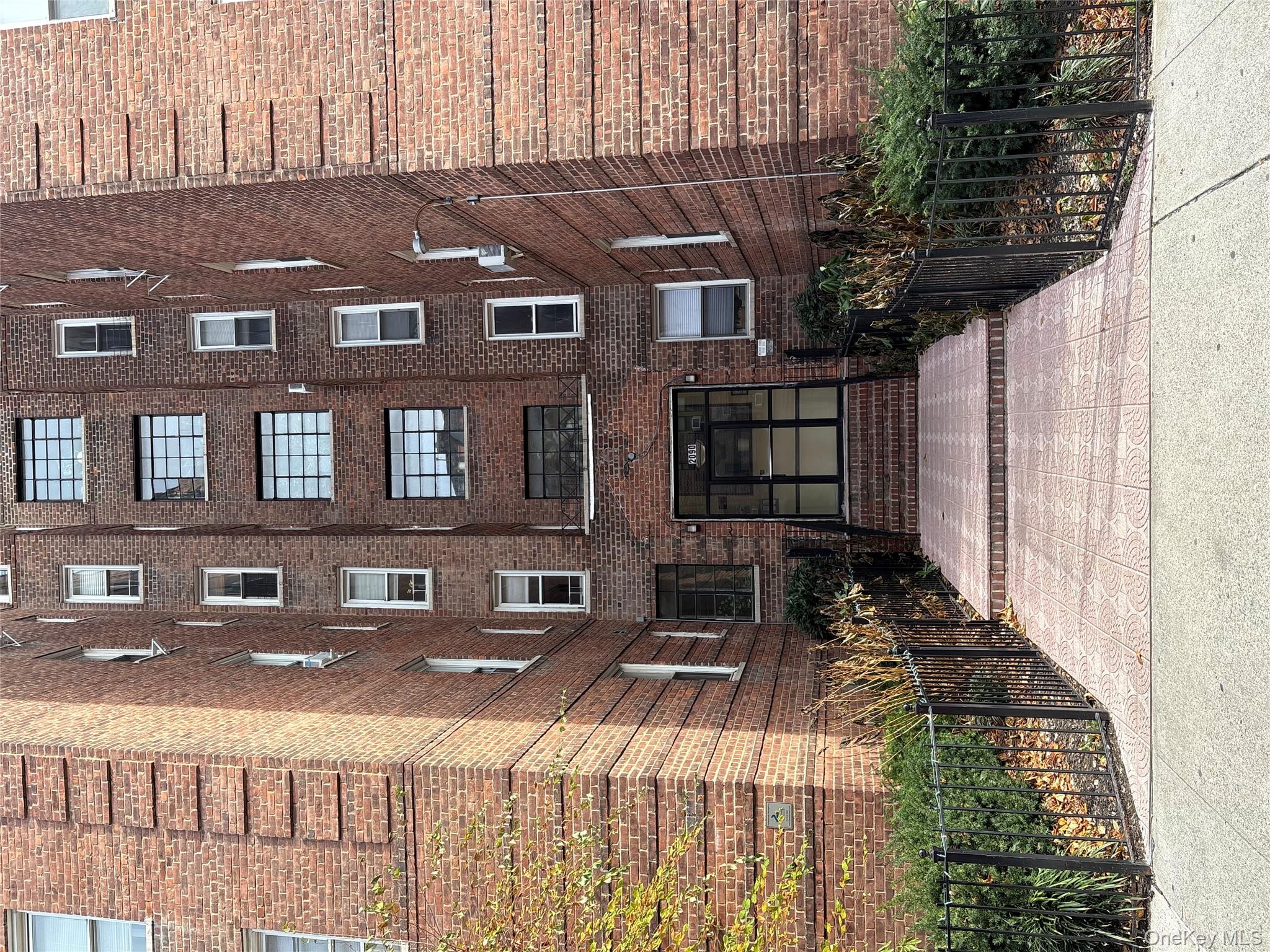 2090 Barnes Avenue, Unit 4D Bronx, NY 10462 - Photo 14 of 14 a view of a brick building