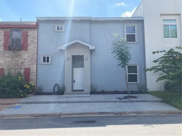 a front view of house with yard