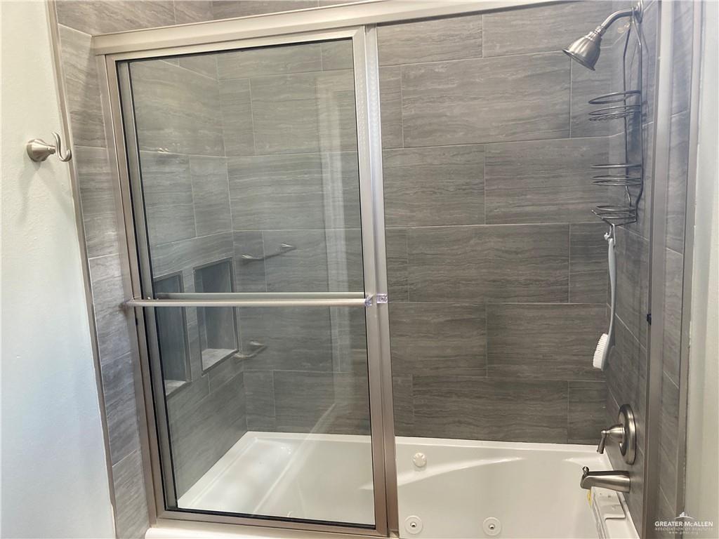 2103 South 6th Street McAllen, TX 78503 - Photo 12 of 33 Full bath featuring a combined bath / shower with jetted tub