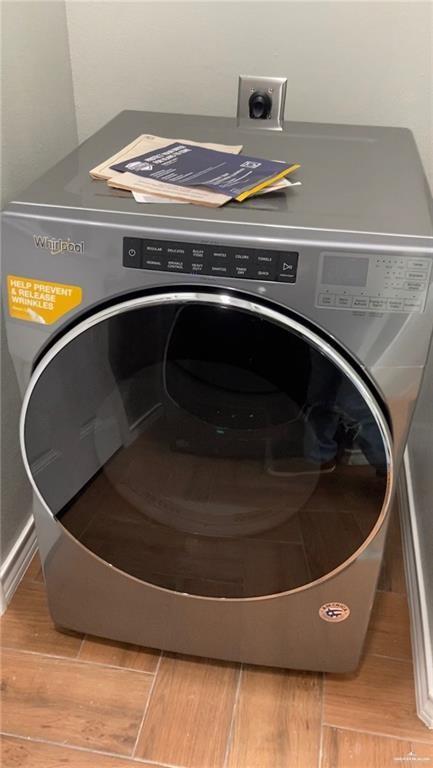 2103 South 6th Street McAllen, TX 78503 - Photo 19 of 33 Laundry area featuring washer / dryer and light wood-style floors