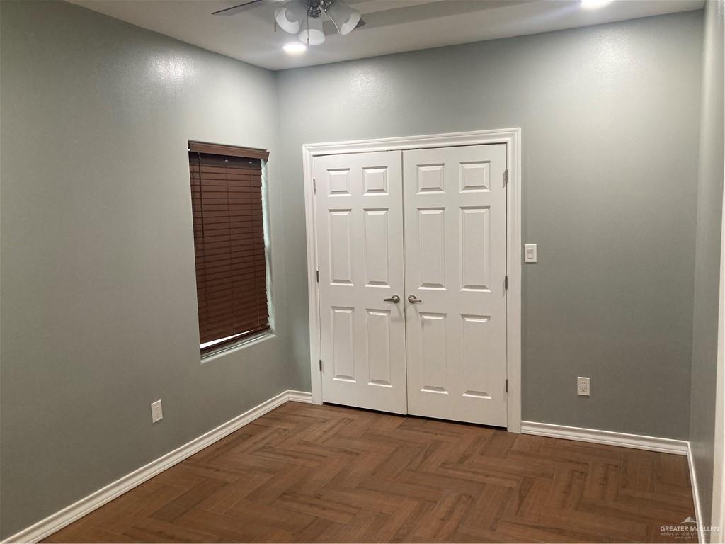 2103 South 6th Street McAllen, TX 78503 - Photo 24 of 33 Unfurnished bedroom with a closet and ceiling fan
