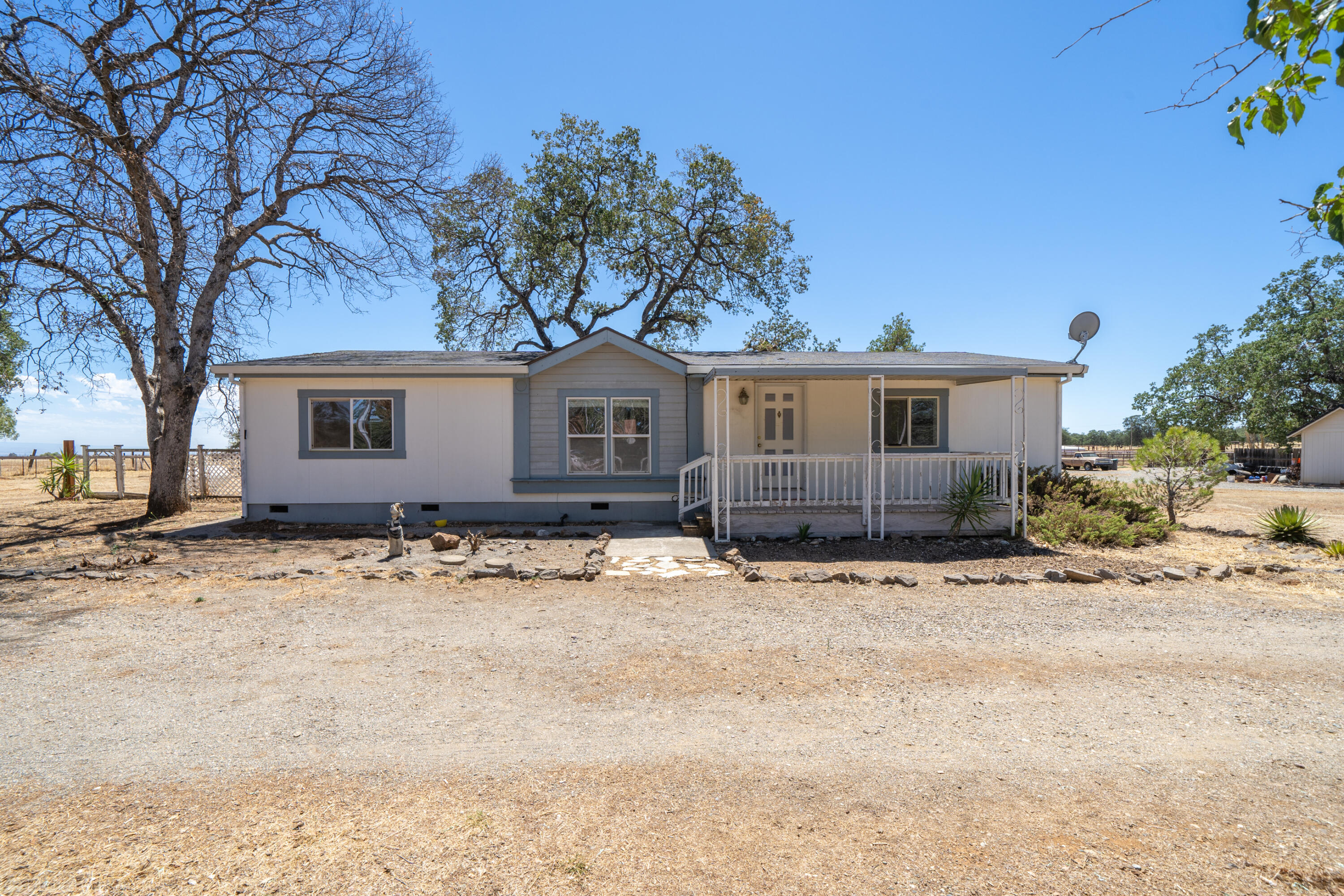 19035 Ridge Road Red Bluff, CA 96080 - Photo 6 of 74 a view of a house with a yard covered in snow