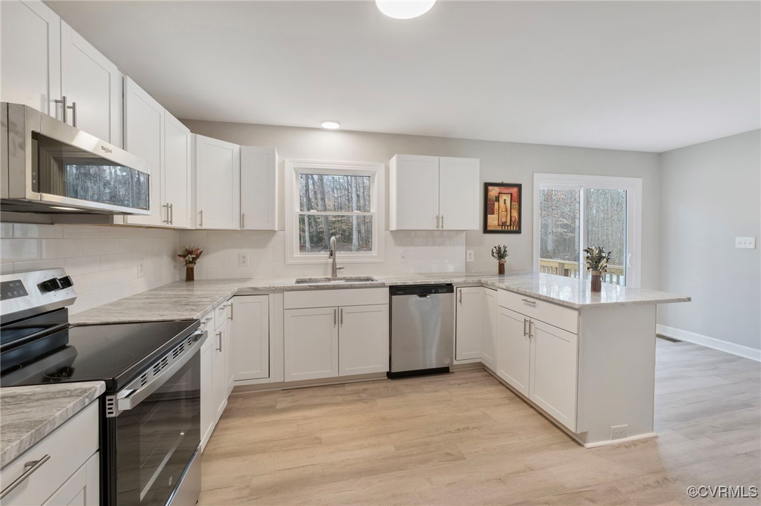 2193 Diggstown Road Bumpass, VA 23024 - Photo 13 of 33 Kitchen featuring a healthy amount of sunlight, a