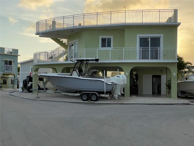a car parked in front of a house