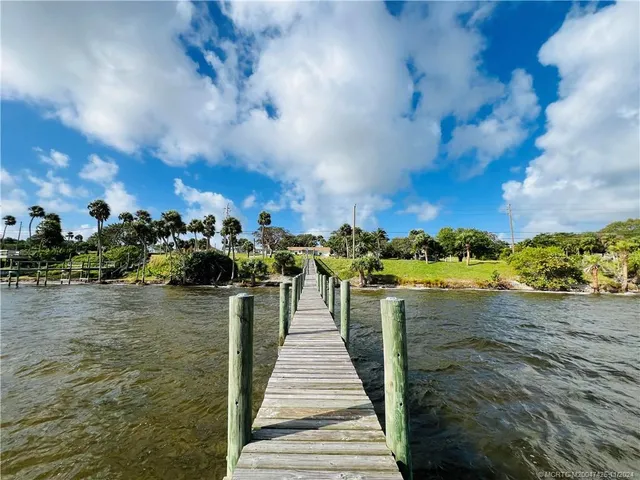 a view of a backyard of the house