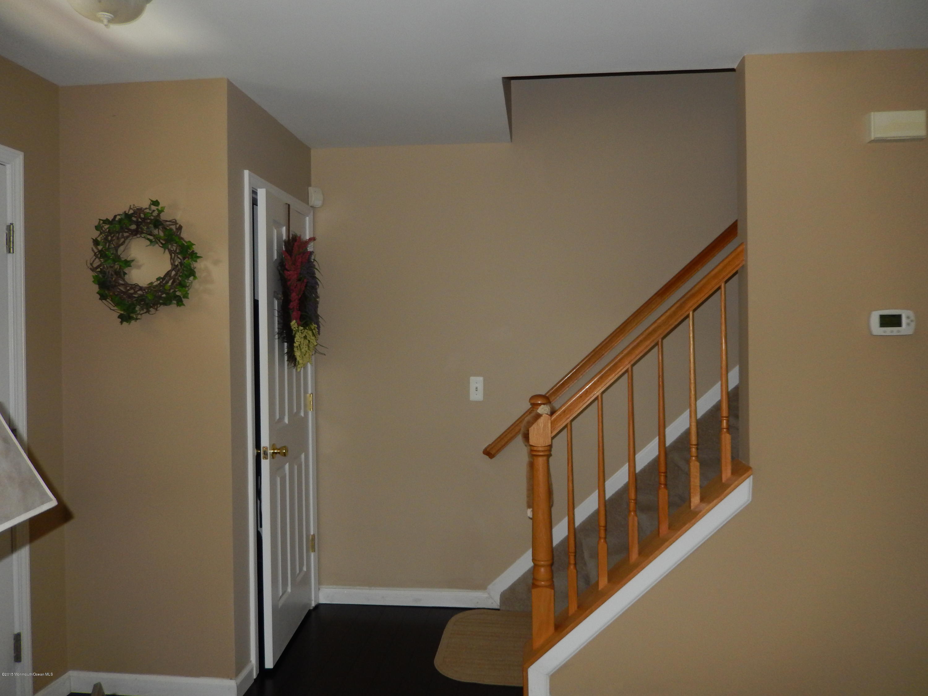 100 Bowsprit Road Manahawkin, NJ 08050 - Photo 9 of 21 a view of an entryway with a door