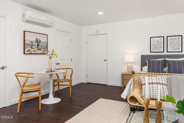 a view of swimming pool with outdoor seating