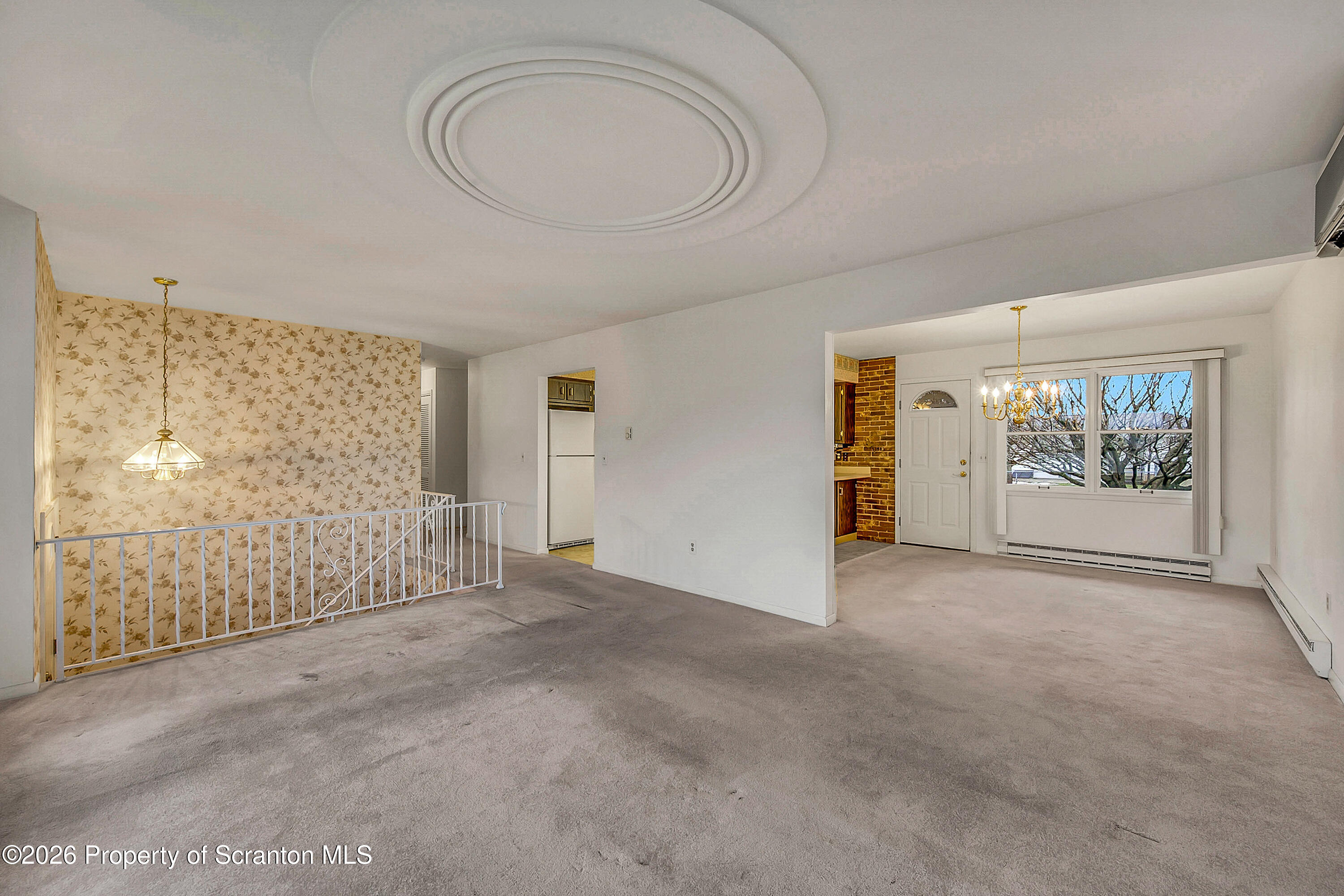 803 June Lane Moosic, PA 18507 - Photo 15 of 36 a view of empty room with floor to ceiling window