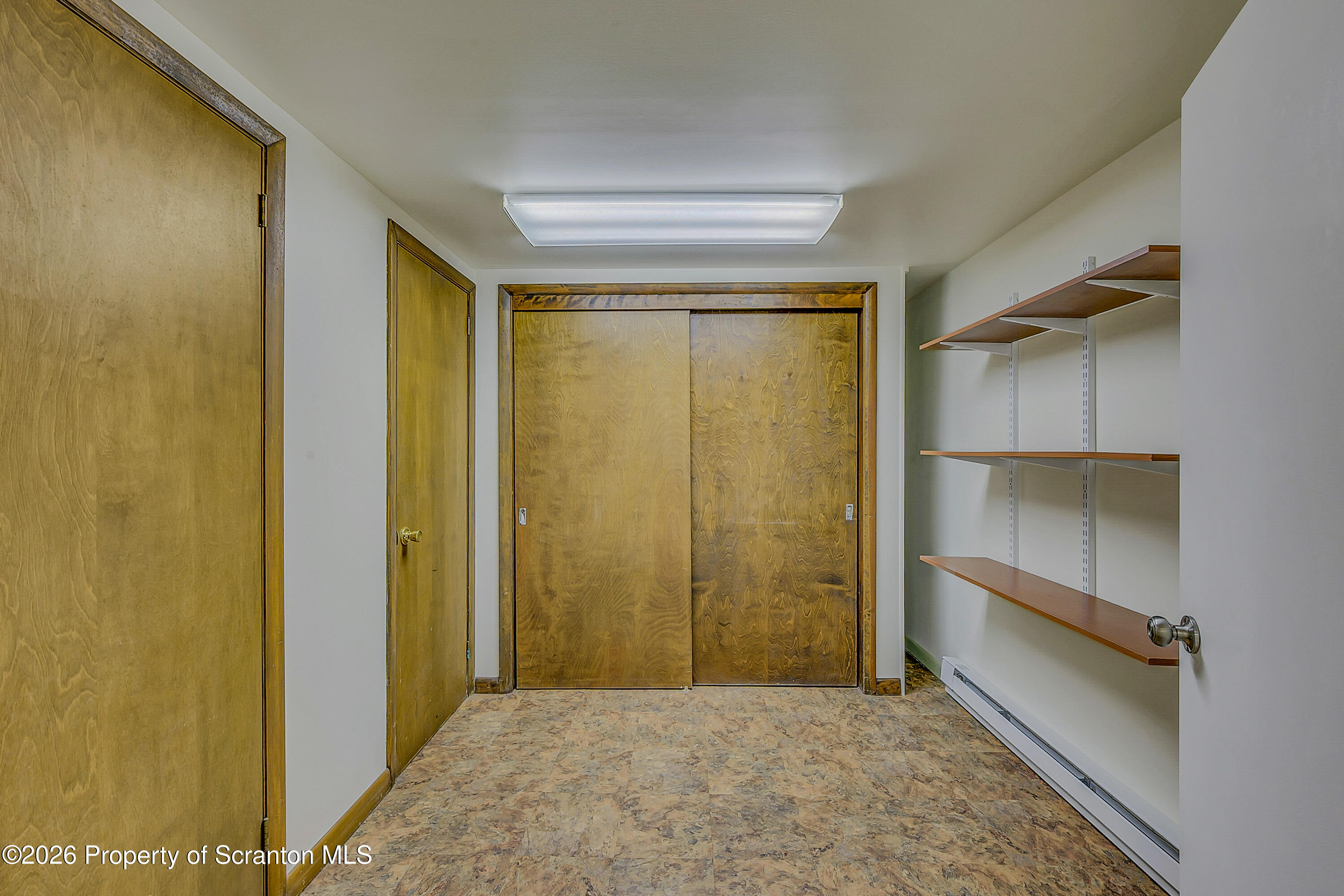 803 June Lane Moosic, PA 18507 - Photo 30 of 36 a view of an empty room and a window