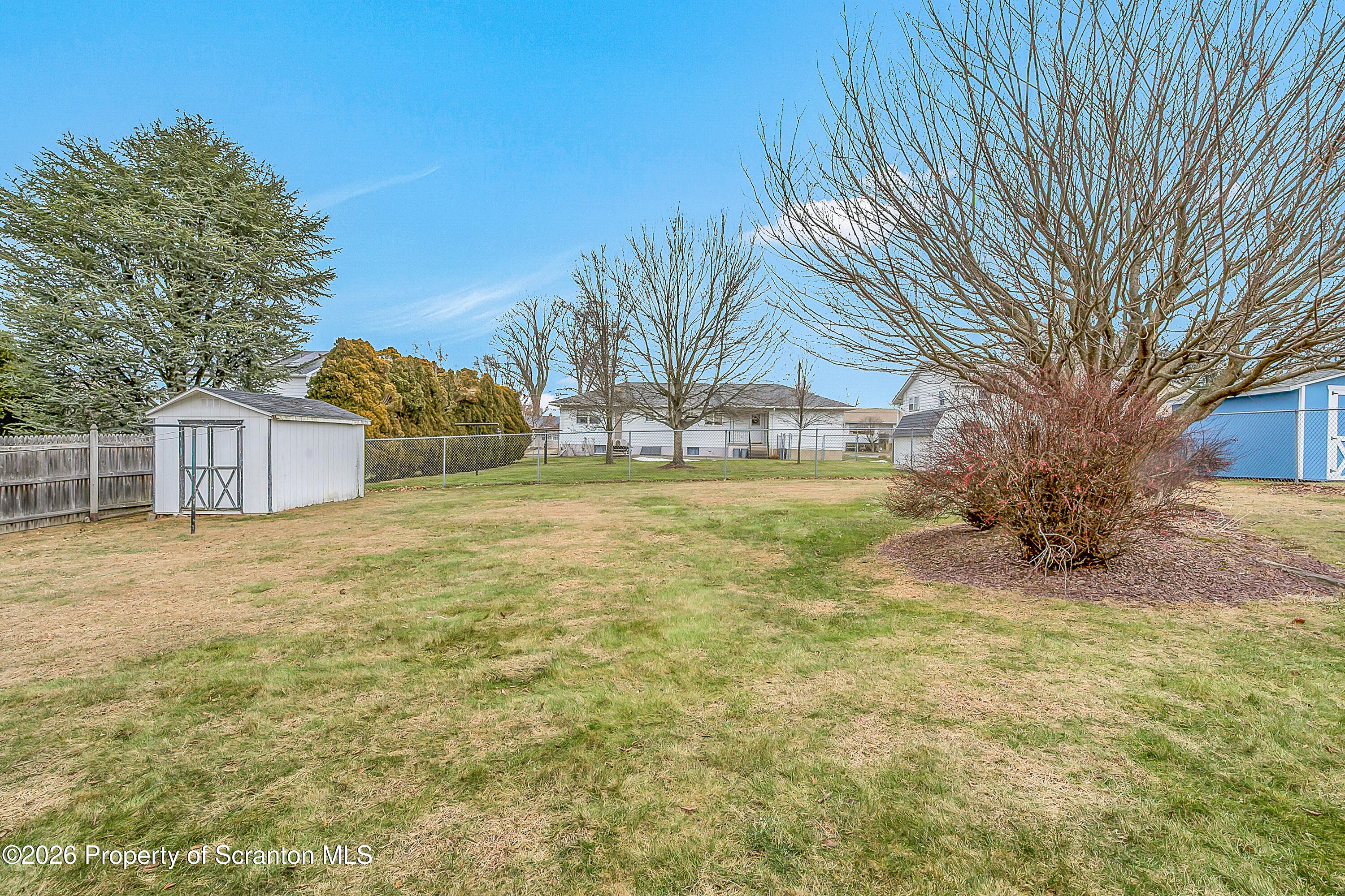 803 June Lane Moosic, PA 18507 - Photo 6 of 36 a view of a house with a yard