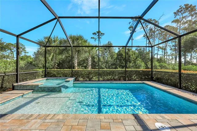 a view of a backyard with sitting area