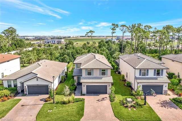 an aerial view of a house with a garden