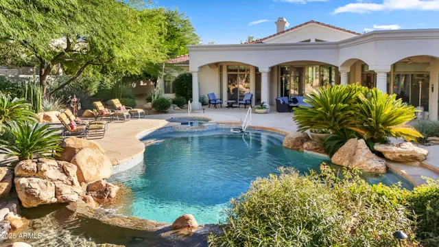 a front view of a house with swimming pool