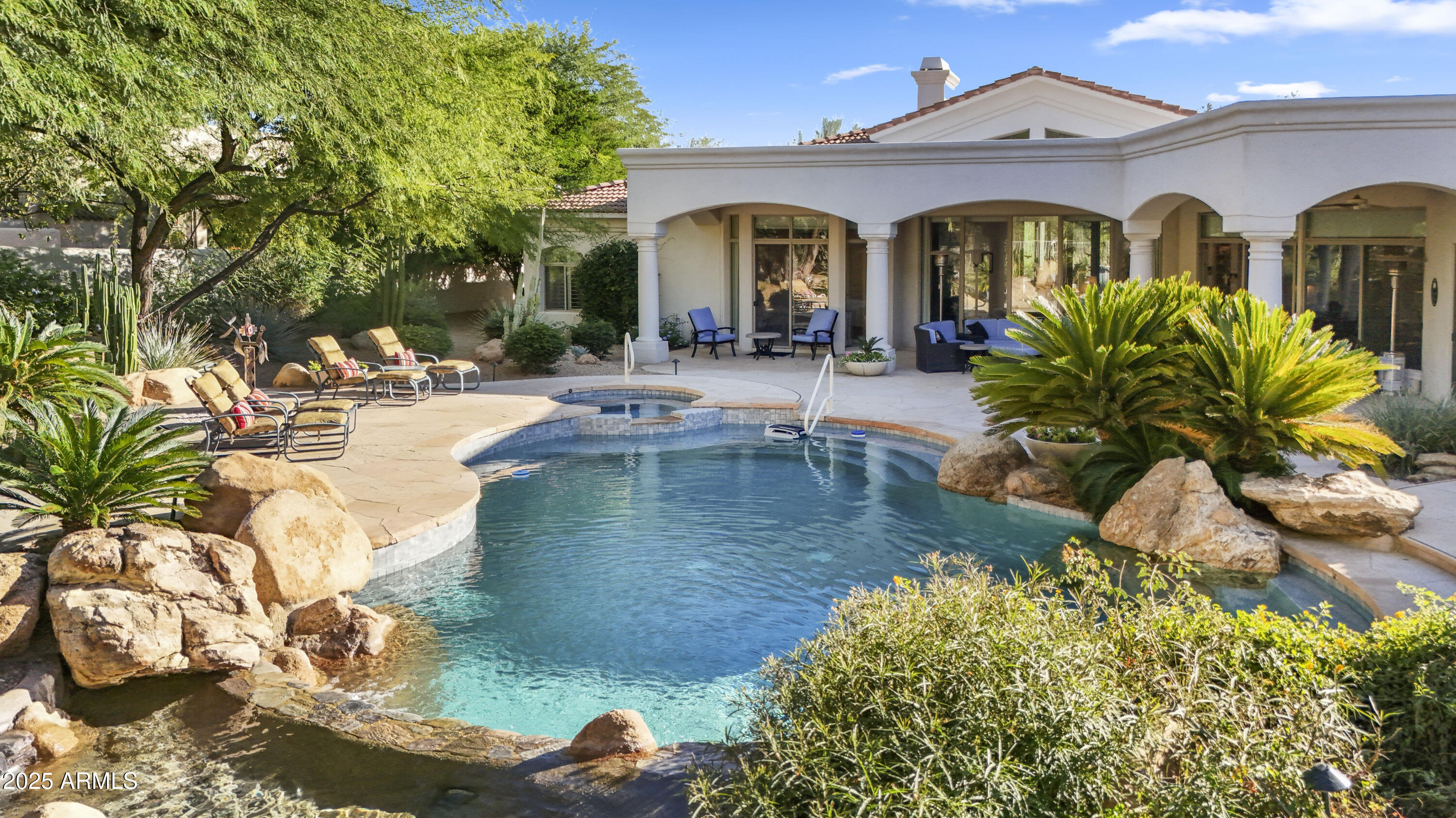 a front view of a house with swimming pool