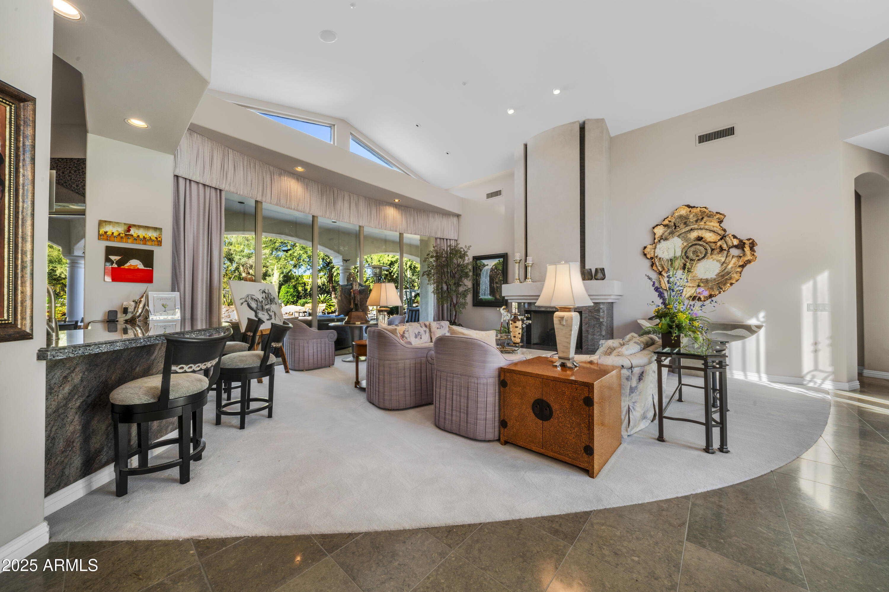 8350 East Via Del Sol Drive Scottsdale, AZ 85255 - Photo 18 of 42 a living room with furniture and a large window