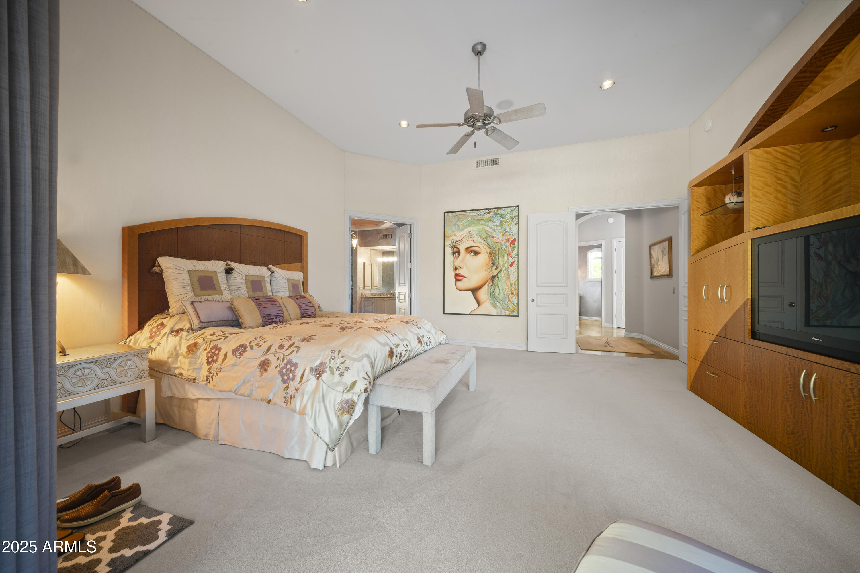 8350 East Via Del Sol Drive Scottsdale, AZ 85255 - Photo 21 of 42 a bedroom with a bed and a couch