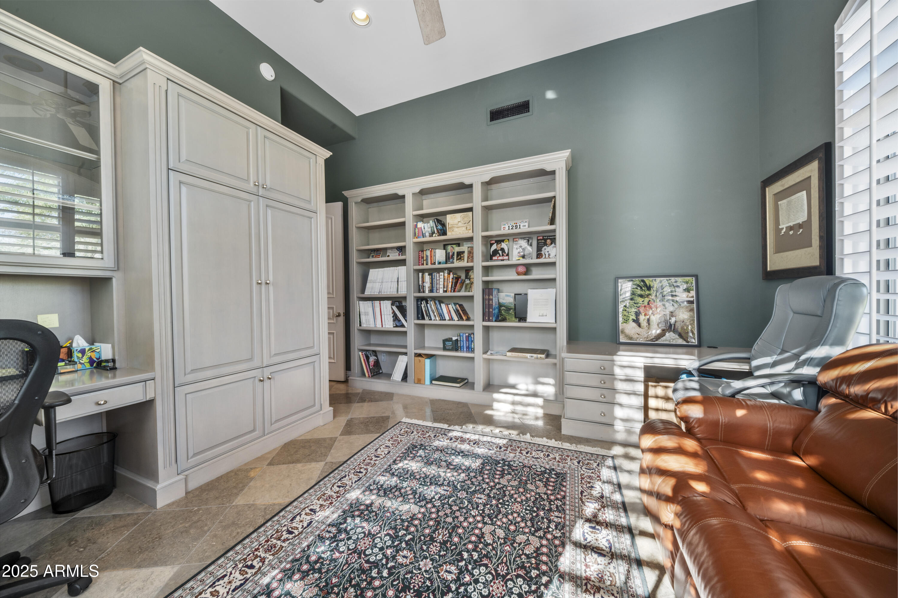 8350 East Via Del Sol Drive Scottsdale, AZ 85255 - Photo 35 of 42 a living room with furniture a rug and a window