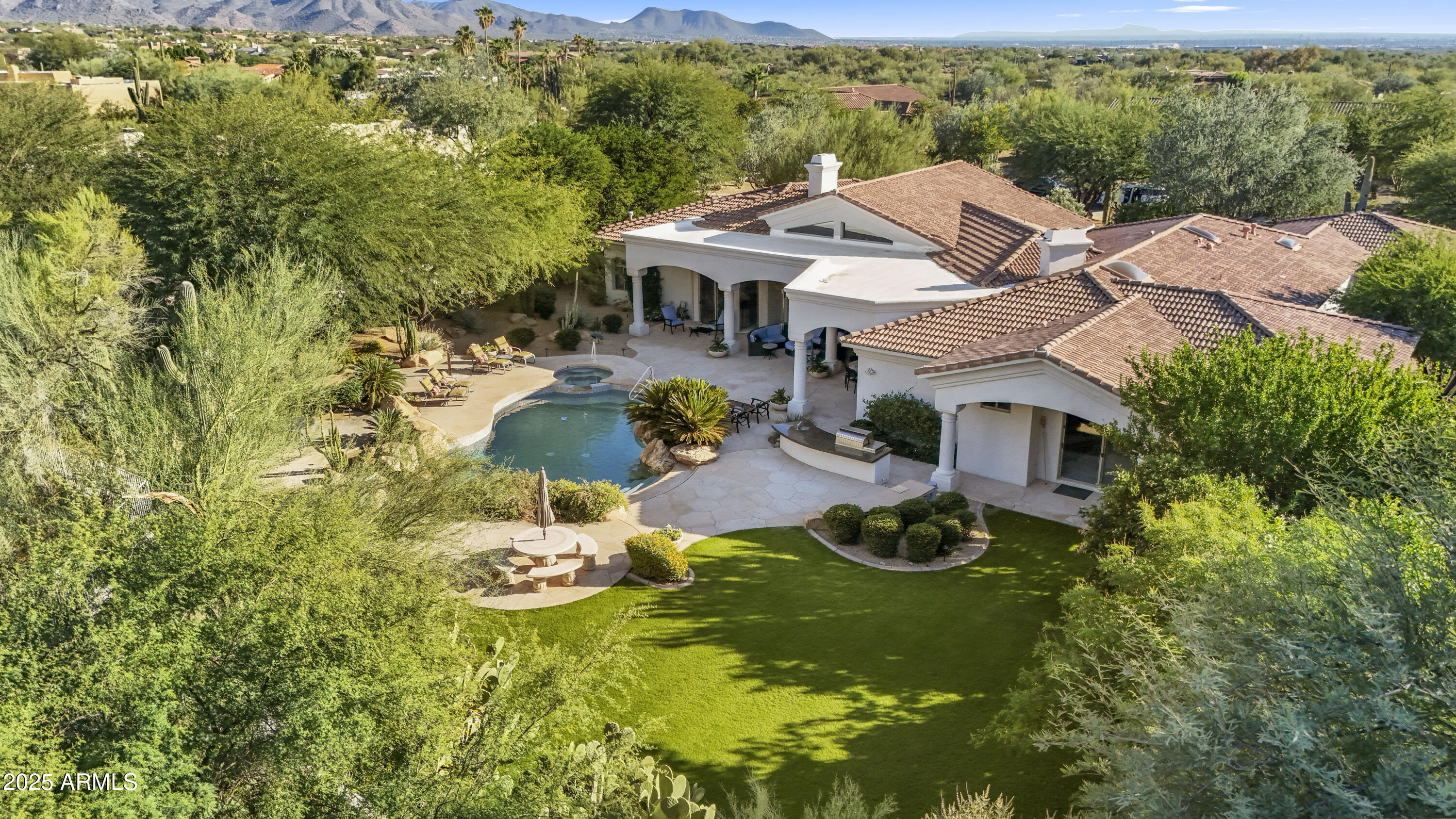 8350 East Via Del Sol Drive Scottsdale, AZ 85255 - Photo 42 of 42 an aerial view of residential houses with yard