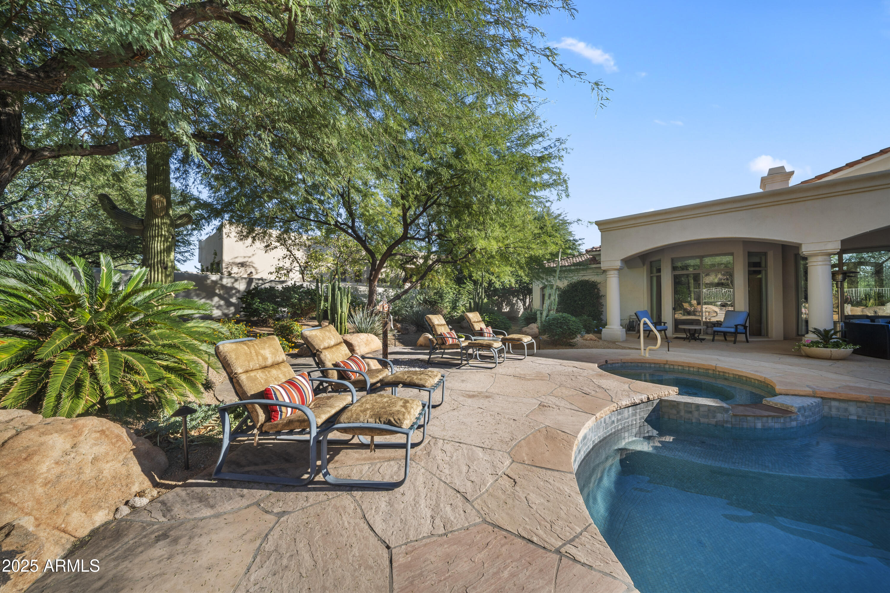 8350 East Via Del Sol Drive Scottsdale, AZ 85255 - Photo 5 of 42 a view of a backyard with sitting area