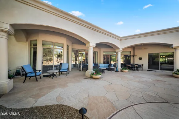 a living room with furniture and a table