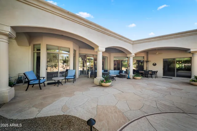 a living room with furniture and a table