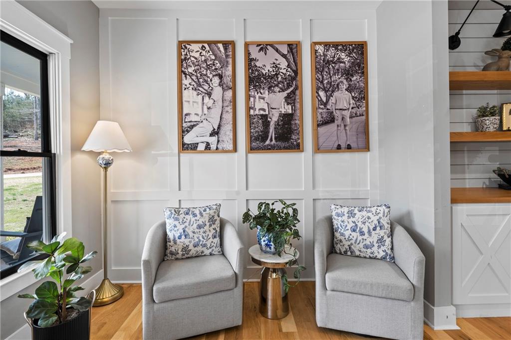 211 Cowart Road Dawsonville, GA 30534 - Photo 12 of 101 a living room with furniture and a large window