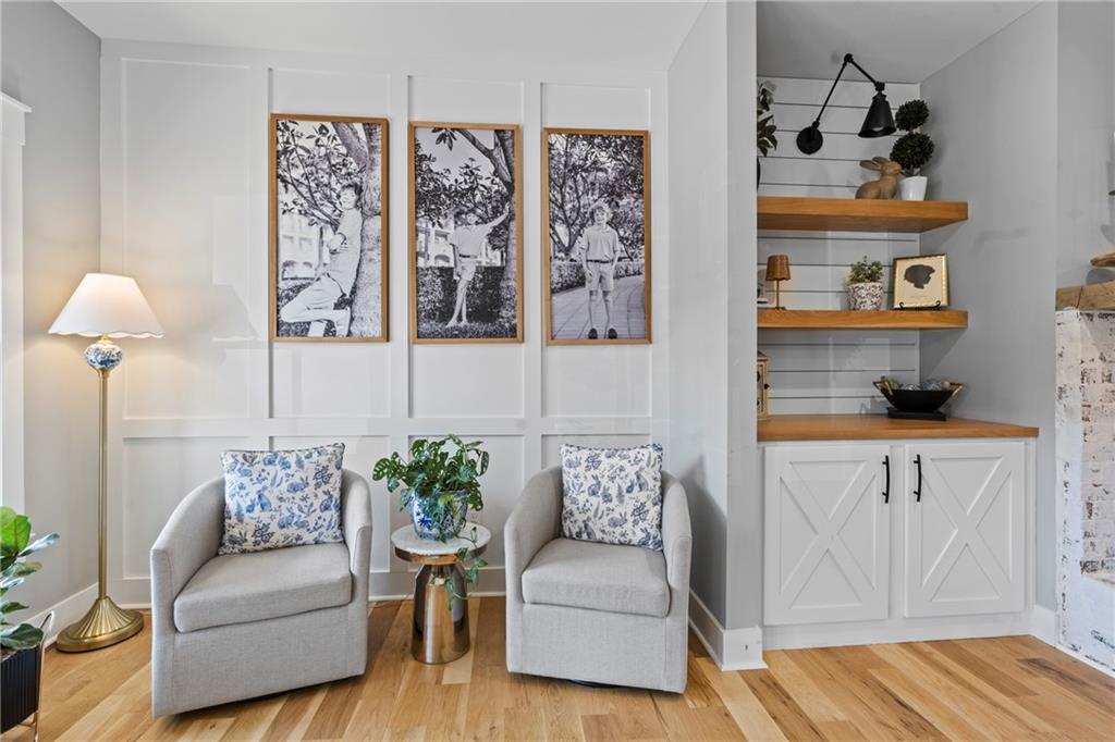 211 Cowart Road Dawsonville, GA 30534 - Photo 13 of 101 a living room with furniture and painting on the wall