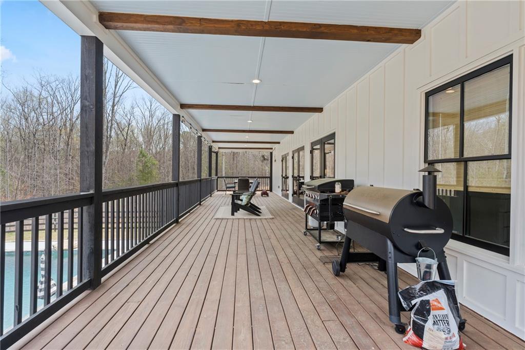211 Cowart Road Dawsonville, GA 30534 - Photo 67 of 101 a view of a workspace with furniture and a window