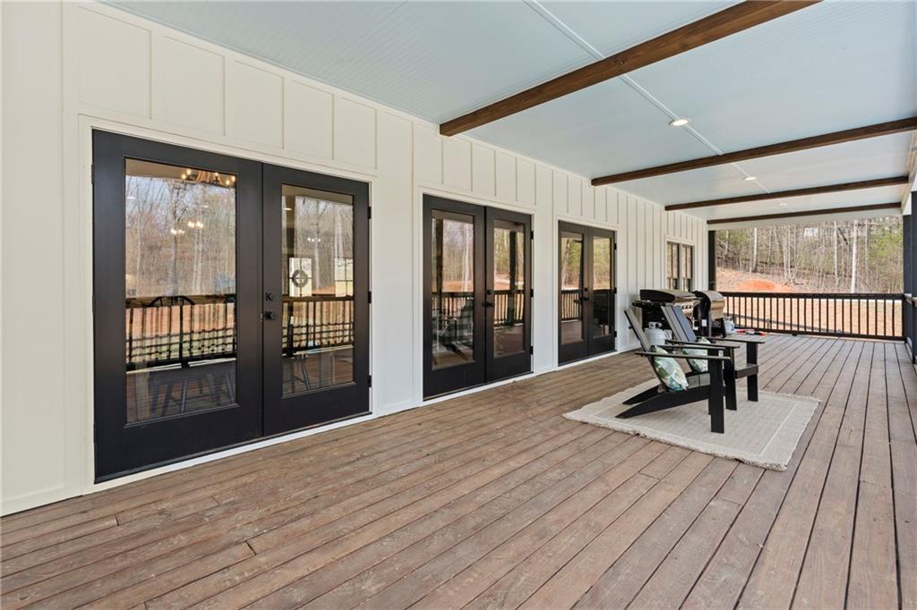 211 Cowart Road Dawsonville, GA 30534 - Photo 72 of 101 a view of a livingroom with furniture and hardwood floor