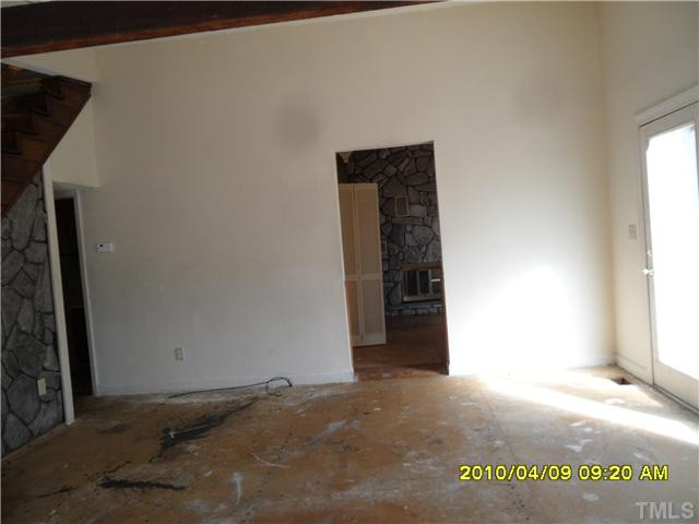 801 Sunnybrook Road Raleigh, NC 27610 - Photo 7 of 16 a view of an empty room with a window