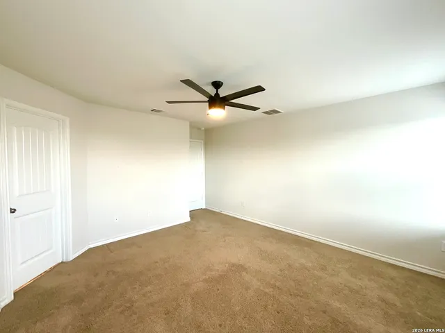 a view of a room with an empty space