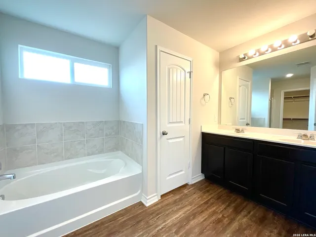 a view of a backyard of the house