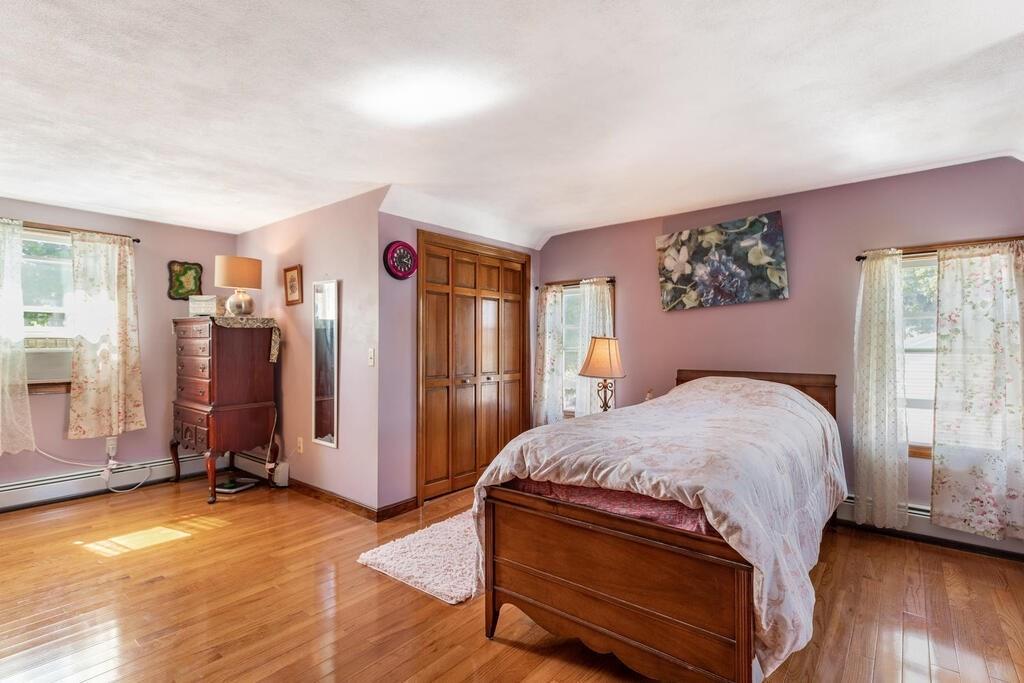 10 John Road Peabody, MA 01960 - Photo 27 of 35 a bedroom with a bed and a window