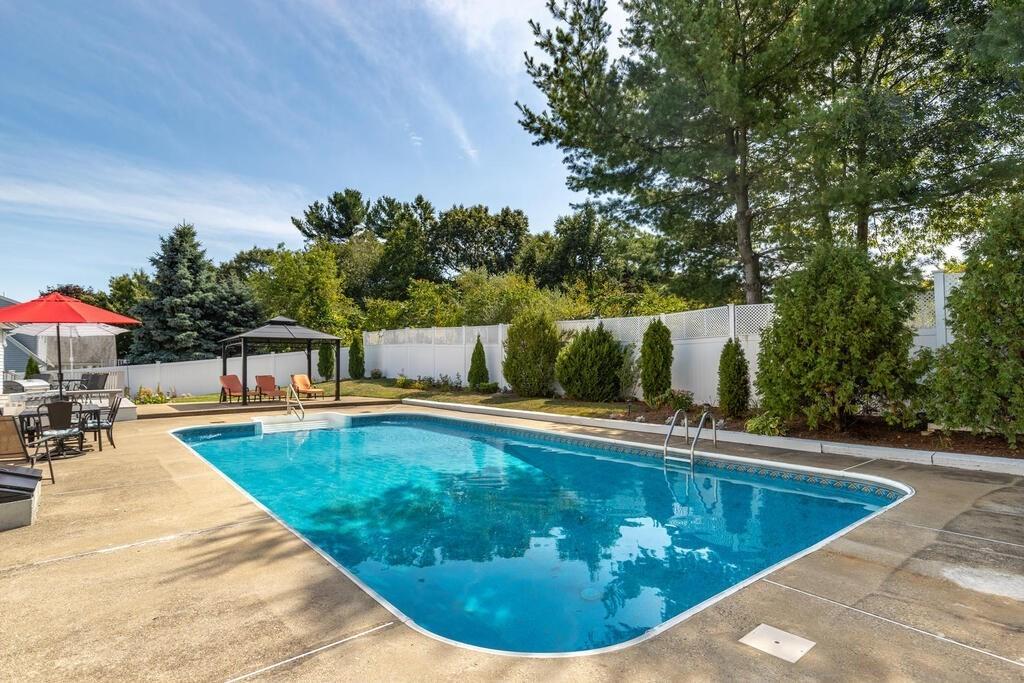 10 John Road Peabody, MA 01960 - Photo 32 of 35 a view of a swimming pool with sitting area