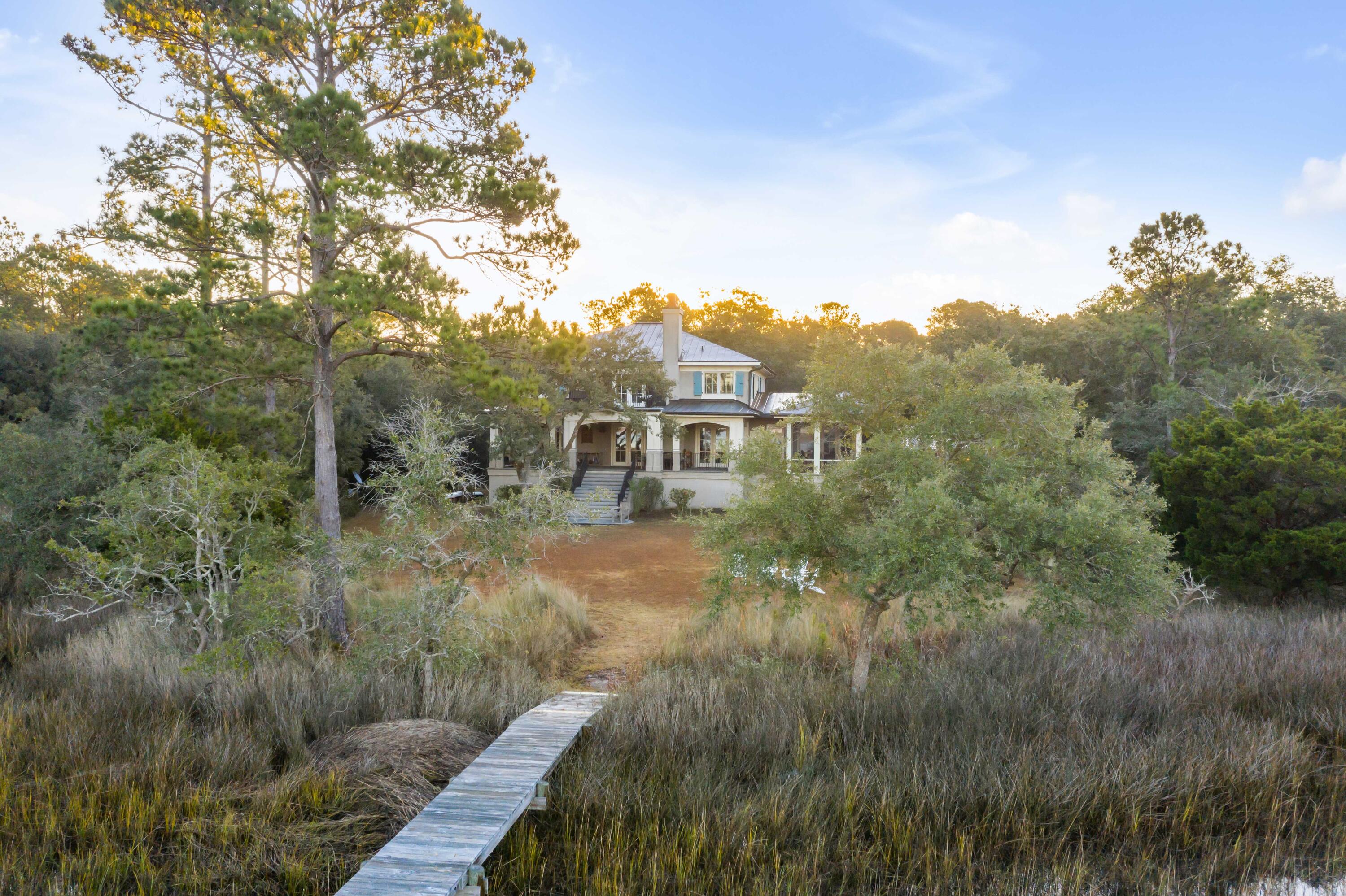 6080 Josie Ridge Road Wadmalaw Island, SC 29487 - Photo 78 of 86 Dock and house