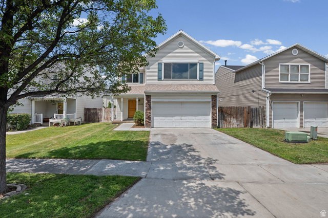 1346 Archmore Drive Springville, UT 84663 - Photo 28 of 32 Two-story home with light-colored siding and a two-car garage