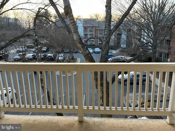 a view of a wooden fence