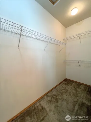 a view of a room with racks on the wall