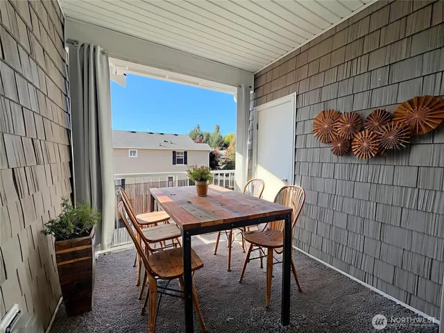 a view of a outdoor seating area with furniture