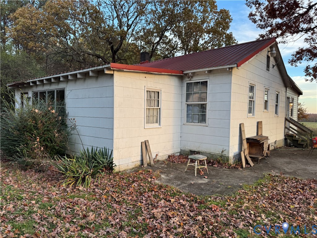 730 County Line Road Cullen, VA 23934 - Photo 2 of 9 a backyard of a house with yard and outdoor seating