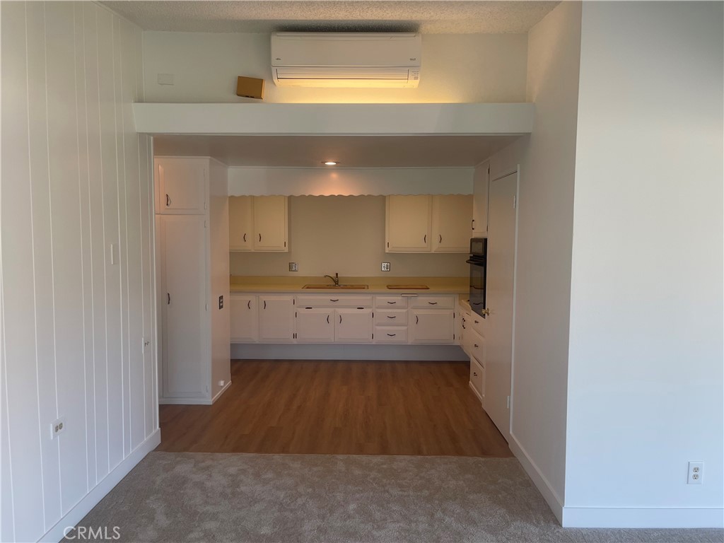 1281 Mayfield Road, Unit 6 56A Seal Beach, CA 90740 - Photo 8 of 10 a view of a bathroom with a sink
