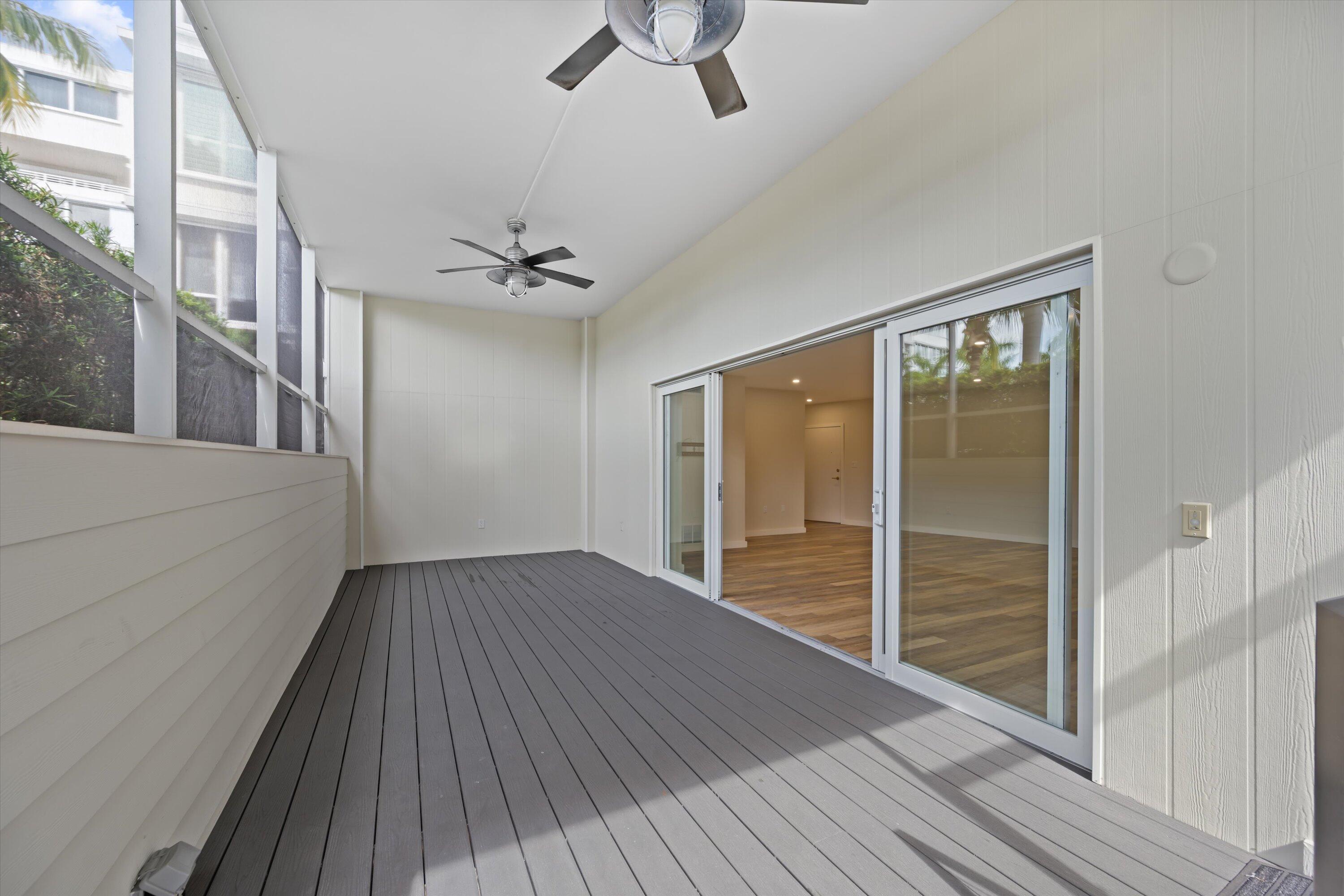 44 Cocoanut Row, Unit T27 Palm Beach, FL 33480 - Photo 18 of 40 wooden floor in an empty room with a window