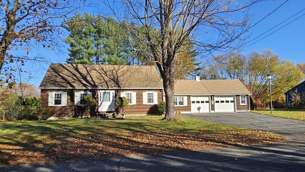 13 Capt Lathrop Drive Deerfield, MA 01373 - Photo 2 of 34 front view of a house with a tree