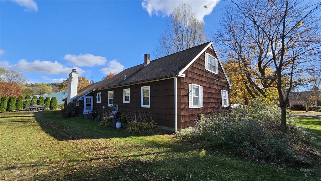 13 Capt Lathrop Drive Deerfield, MA 01373 - Photo 3 of 34 a front view of a house with a yard