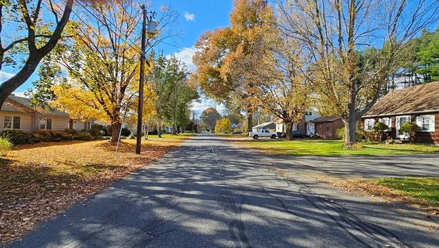 a view of road with trees